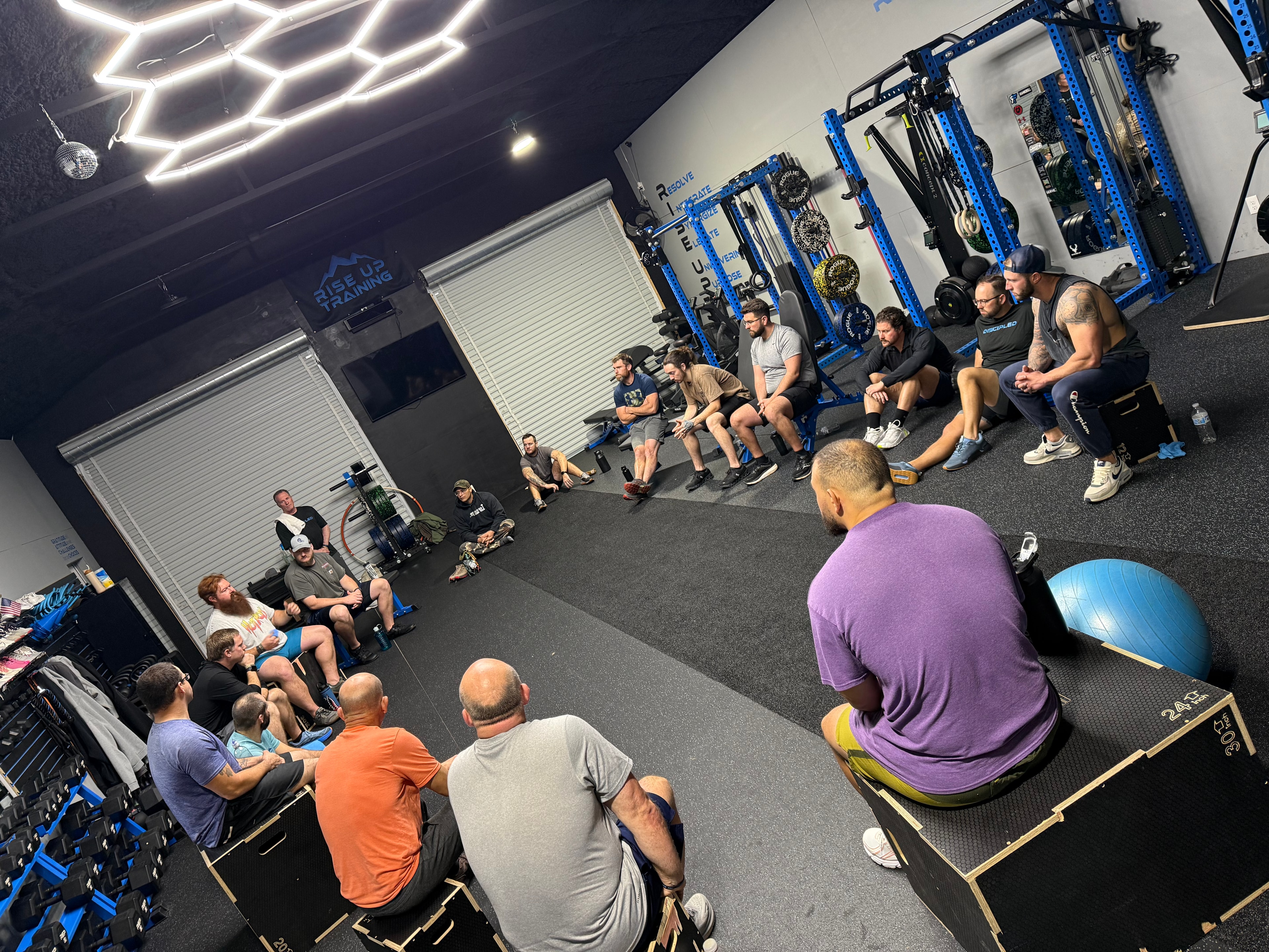 Men gathered at Rise Up Training